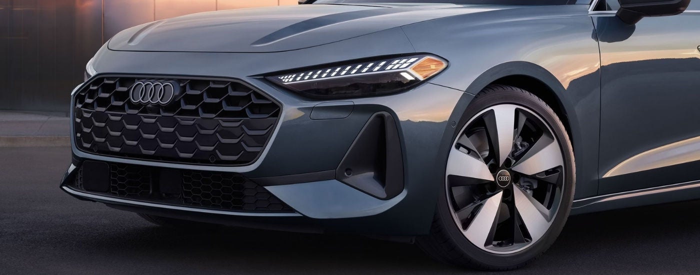 Grille and headlights on a grey 2025 Audi A5.